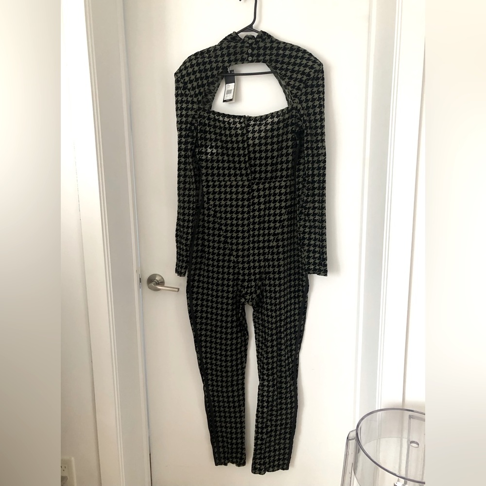 Ivy park adidas jumpsuit. New with tag. Size xlarge